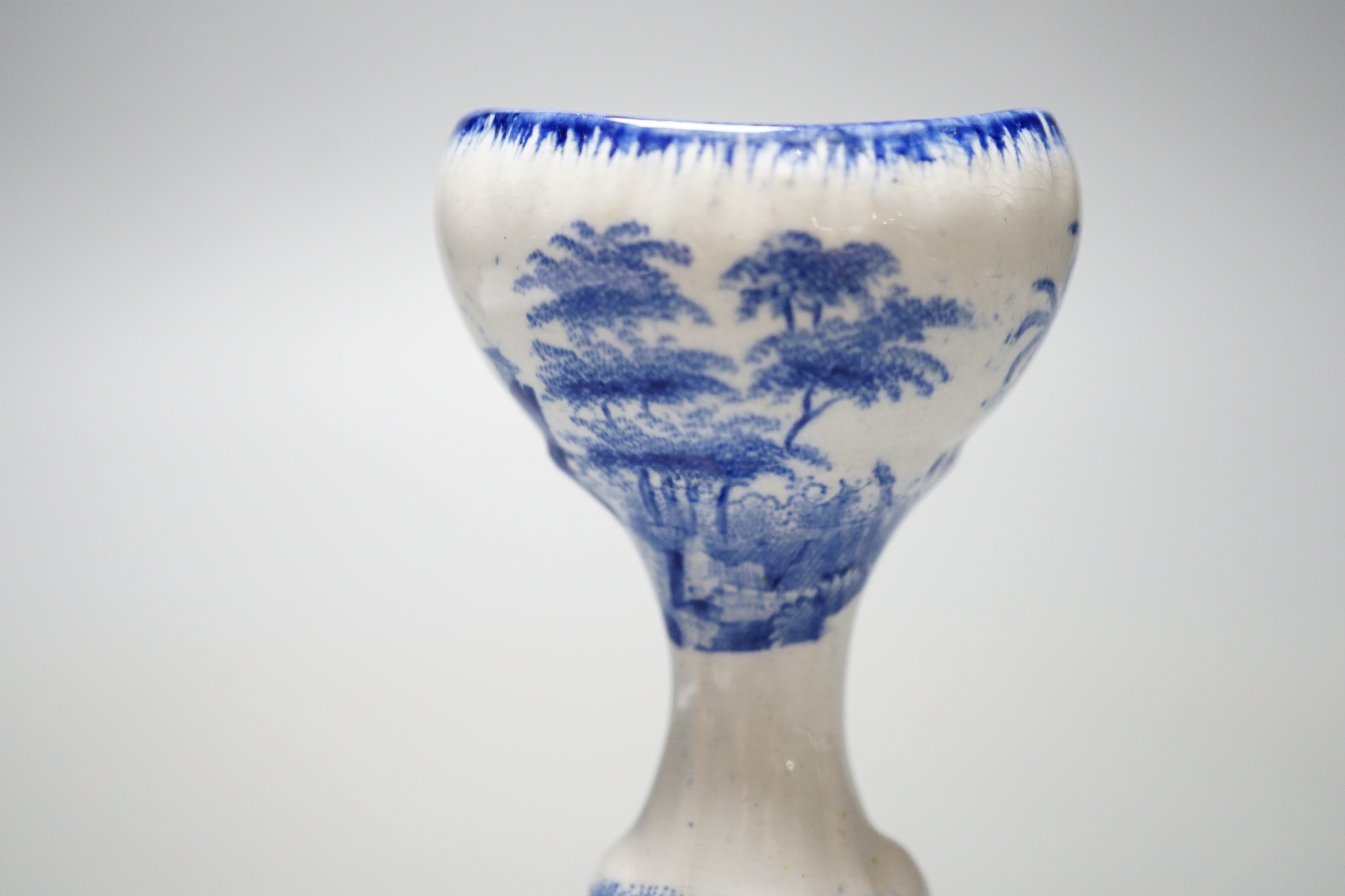 A Spode blue and white transfer printed pottery eye bath, early 19th century 6.9cm high